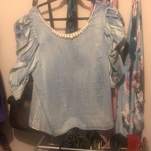 Beautiful stylish jean shirt with pearl neck line trimming! Never worn
